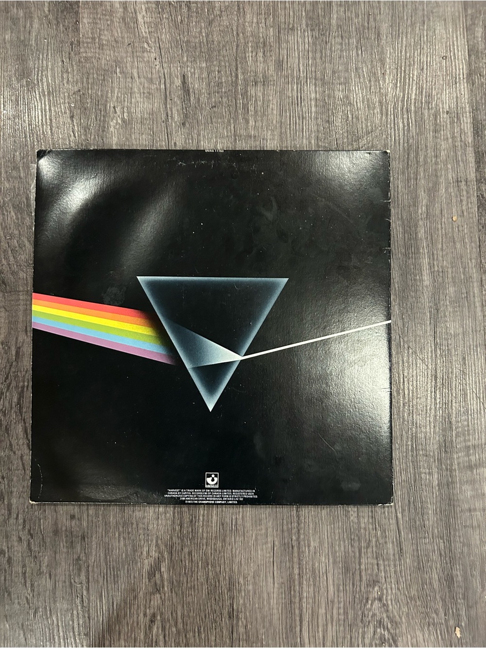 Vintage Album vinyl with Prism Rainbow Artwork pink Floyd dark side of the moon